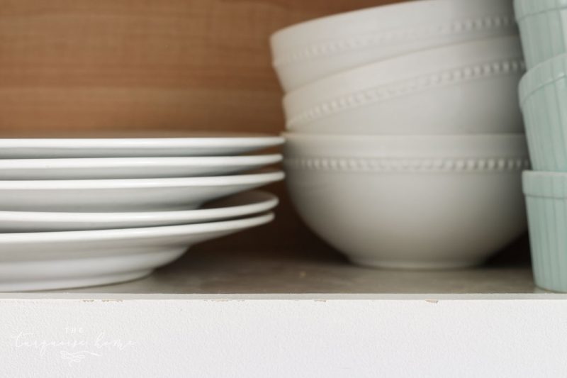 Cabinets painted in Benjamin Moore's Simply White are holding up extremely well after 2 years!