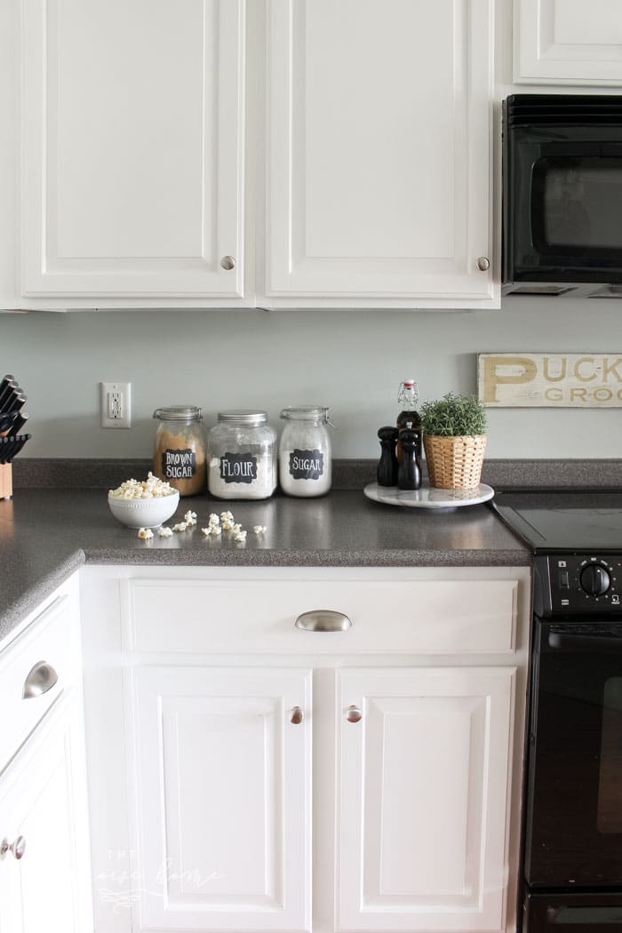 Cabinets painted in Benjamin Moore's Simply White are holding up extremely well after 2 years!