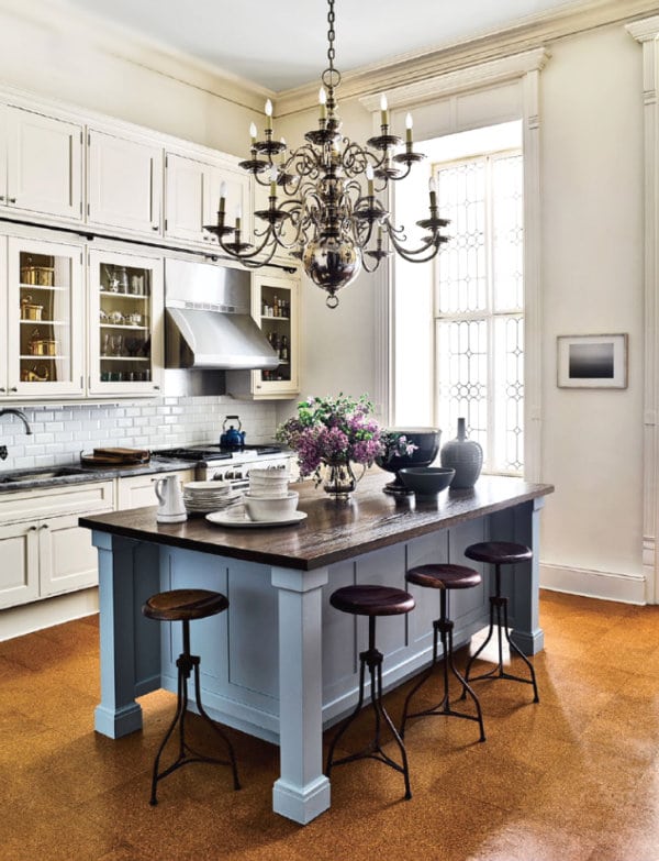 A Moody Blue Island in a cream kitchen.