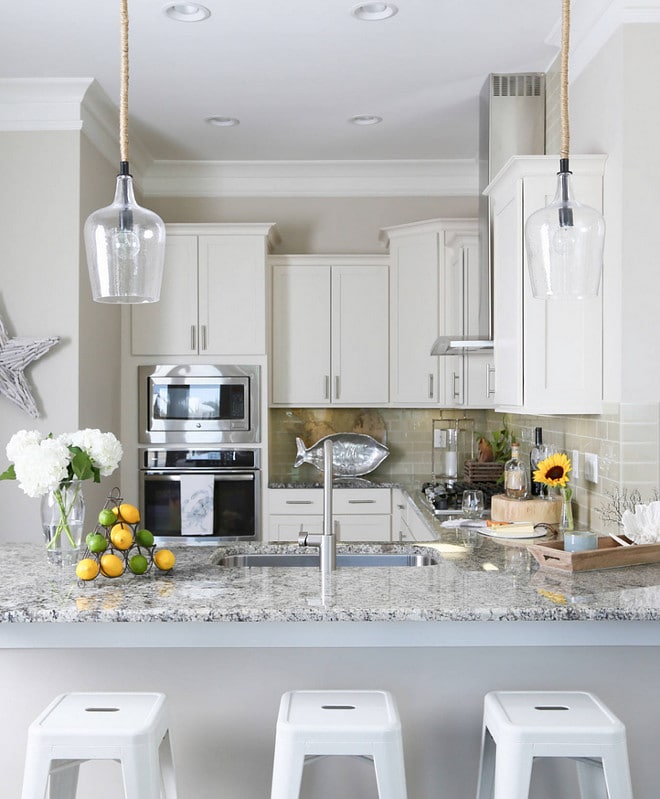 Gorgeous Dover White painted cabinets and Alabaster walls - both colors from Sherwin Williams. LOVE these two colors together! | Top Favorite White Paint Colors