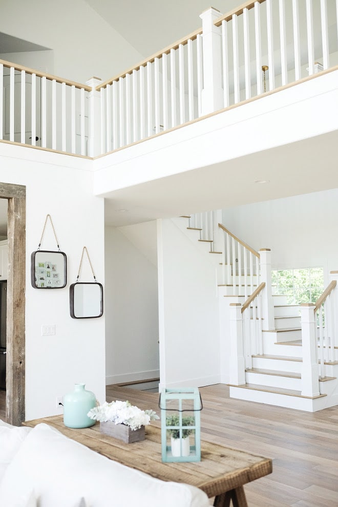 Extra White Paint Color from Sherwin Williams is GORGEOUS in this staircase landing space. LOVE!! | Top Favorite White Paint Colors 