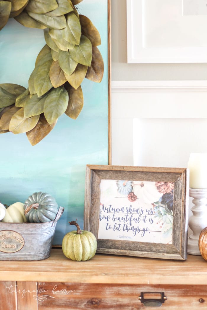 Love this #fixerupper style! Fall console table and gallery wall with tiered farmhouse stand and magnolia wreath