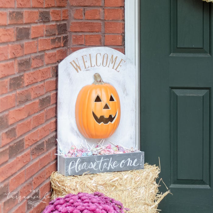 Such a cute option for giving away candy while you're away! DIY Lighted Pumpkin Candy Holder