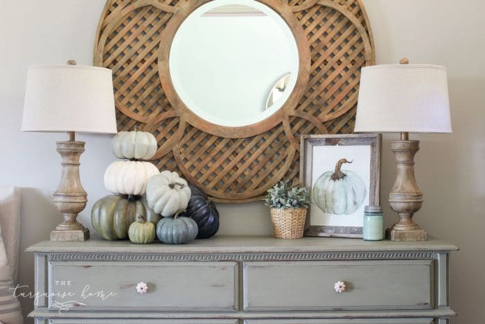 such a simple fall vignette in the entry way ... love the blues and greens!