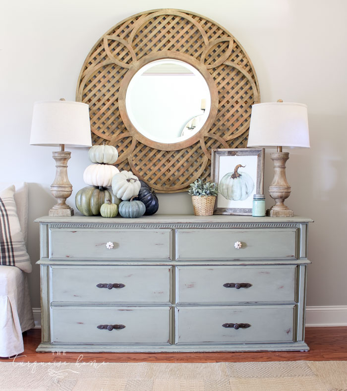 Simple, neutral blues and greens fall entry way ...