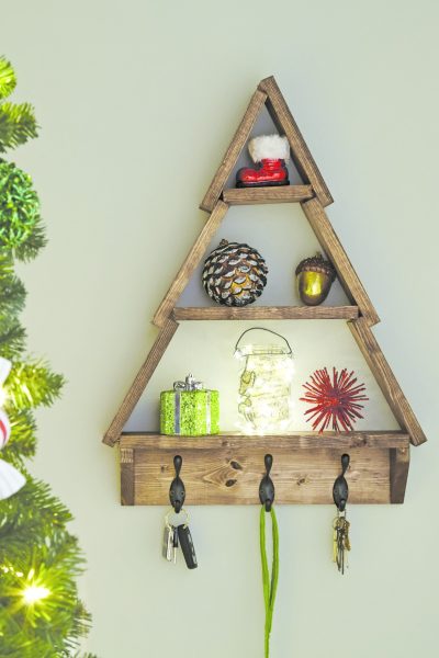 Learn how to make this wonderful Christmas Tree Shelf and put your own spin on this super cute decor. Perfect for the holidays!