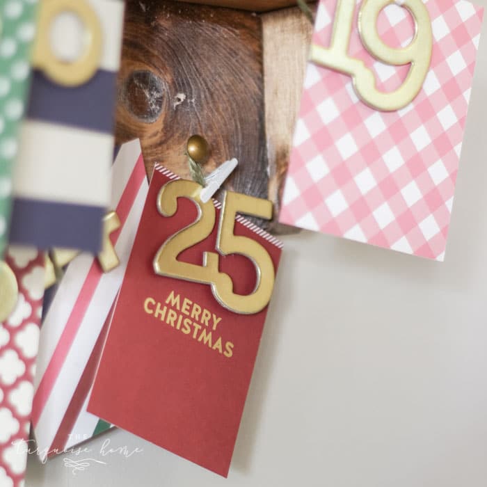 The most adorable DIY snowy Christmas Tree Shelf lends itself to the perfect spot for an advent calendar. LOVE it!!