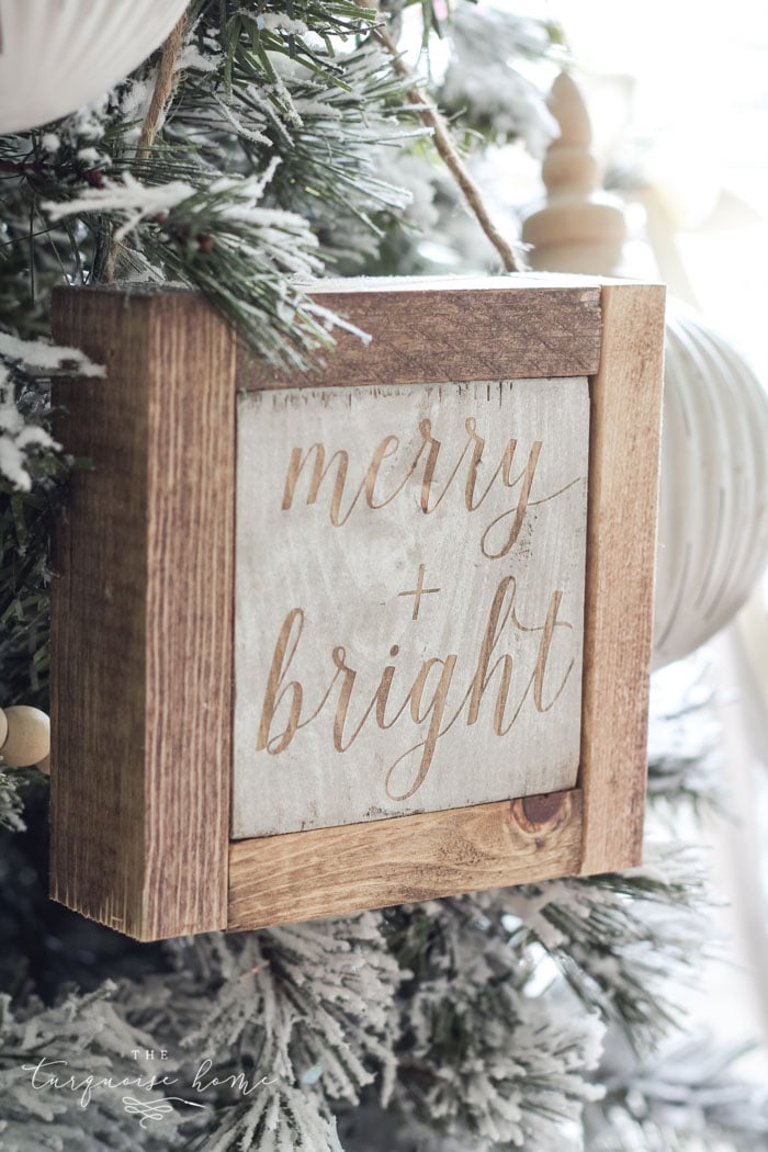 Create a simple wooden sign with a cute saying and create a rustic, farmhouse Christmas look for cheap!