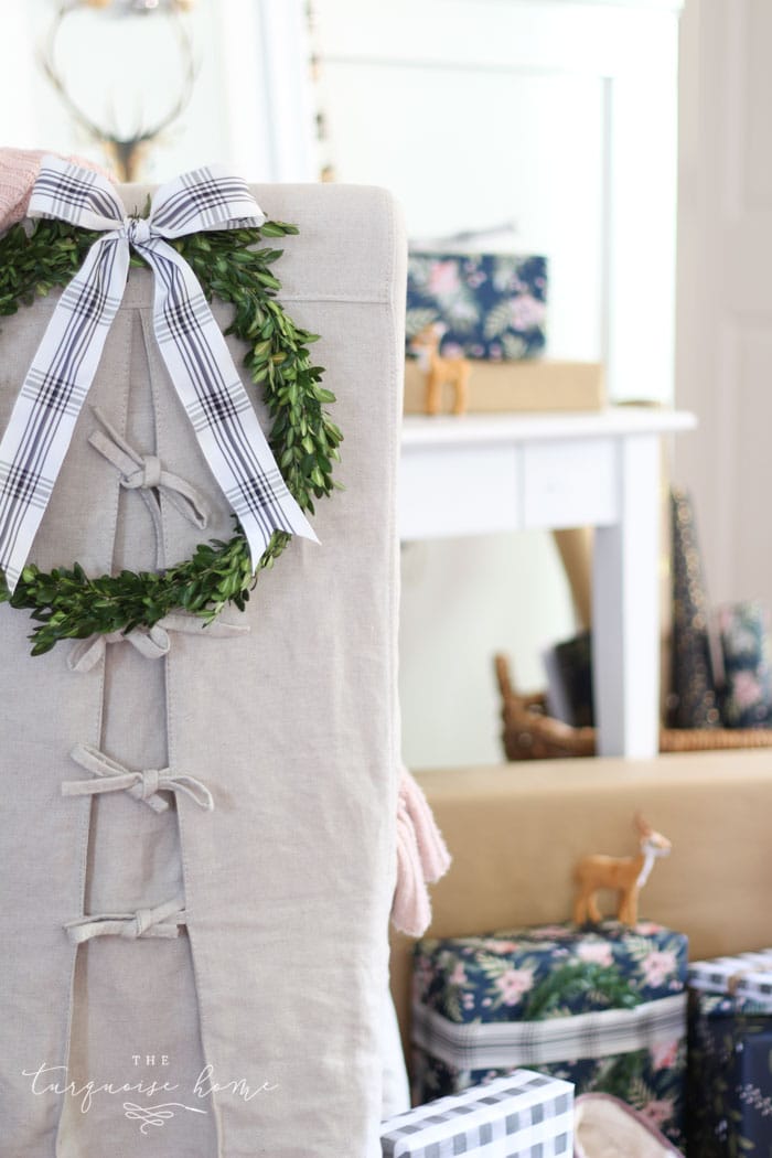 Ribbon and a wreath on the back of a chair