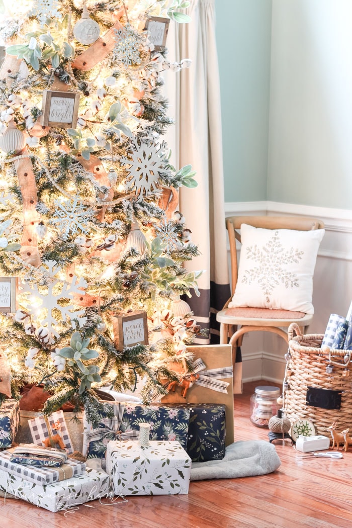 My Flocked Farmhouse Christmas Tree - super cute cotton stems, lamb's ear, galvanized snowflakes, and wooden bead garland.