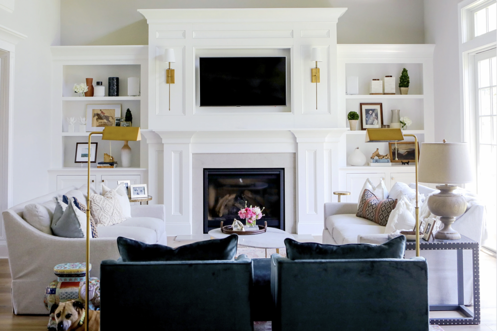 Built-in Bookshelves with TV and sconces