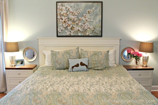 Master Bedroom with a Large Piece of Art over the Bed