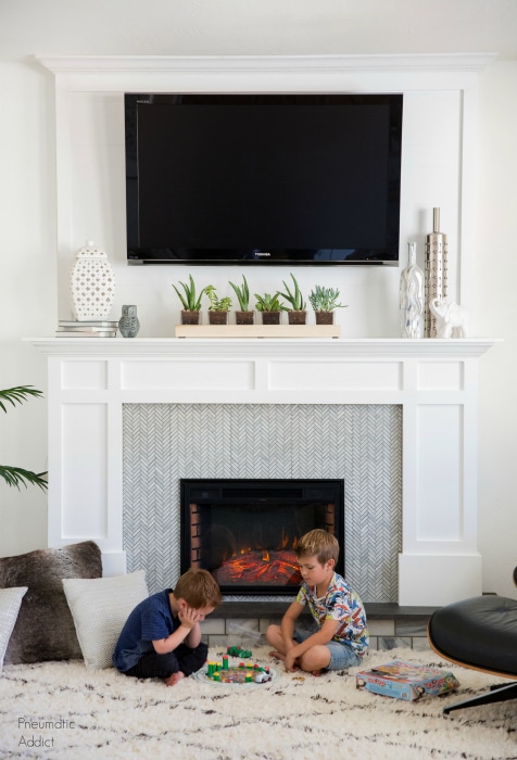 Renter-Friendly Movable Faux Fireplace with TV over the Mantel