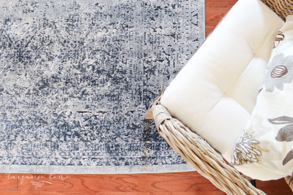 A navy, gray, oatmeal distressed vintage rug. Abbeville Eclectic Dark Gray Area Rug