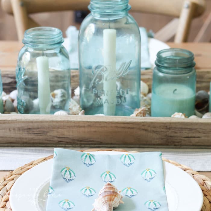 Coastal decor in the dining room with beautiful beachy blues and these coastal napkins from the Opal House line at Target!