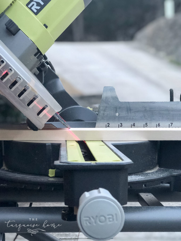 DIY Board and Batten Tutorial - cut the bottom of the battens at a 45º angle to rest on your existing baseboards