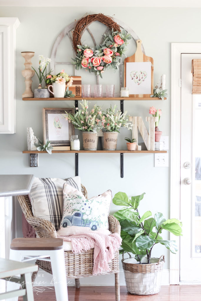 Gorgeous florals on open kitchen shelves... love this look for spring!