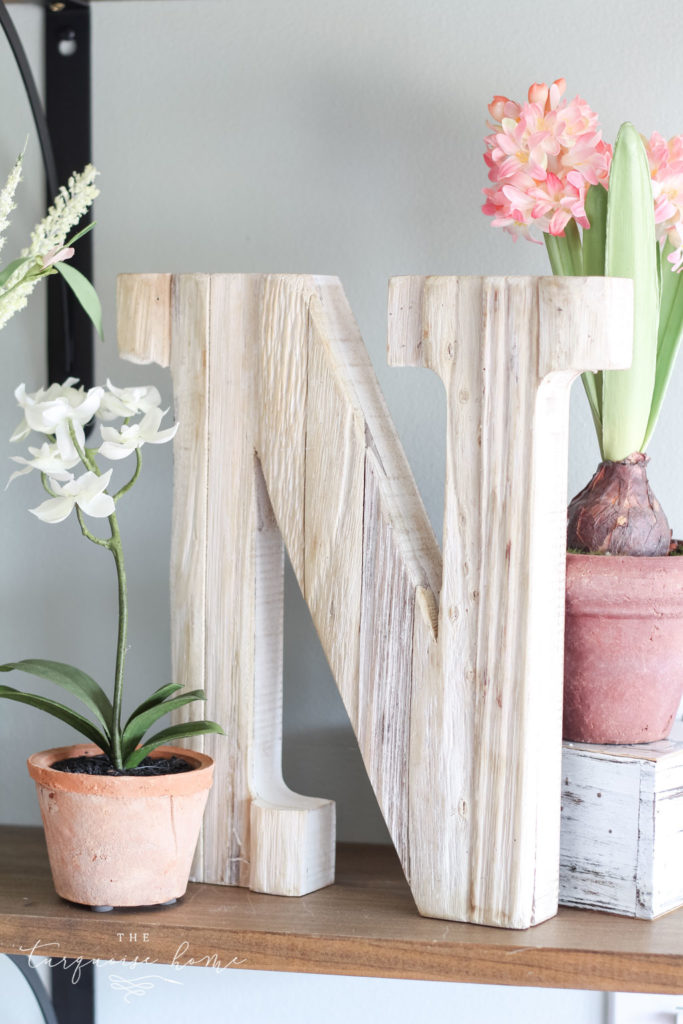 Faux orchids and other flowers make for gorgeous spring decor!