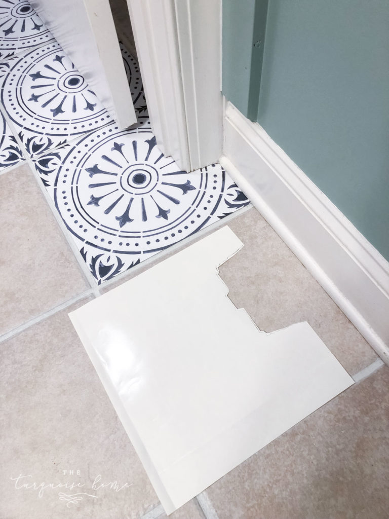 DIY Peel and Stick Vinyl Tile Flooring --> use an old backing to trace the odd angles