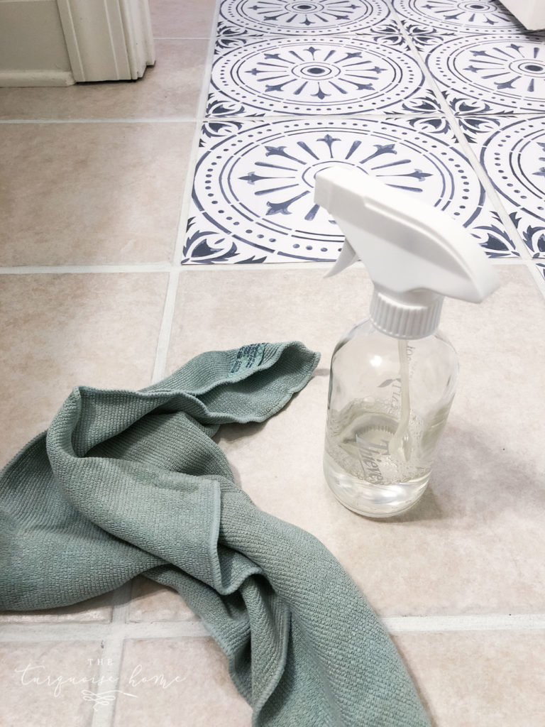 DIY Peel and Stick Vinyl Tile Flooring --> clean the tiles thoroughly before starting!