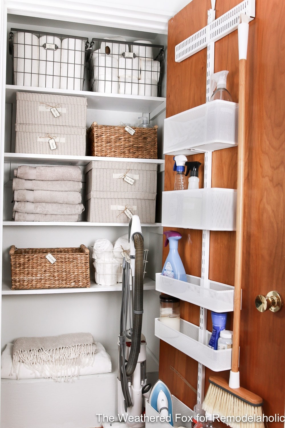 Last, but certainly not least is this beautiful linen closet from the blog Remodelaholic is filled with bins and boxes neatly labeled which I love. Plus, I really want to order a back of the door organizer with adjustable shelves like this one now!