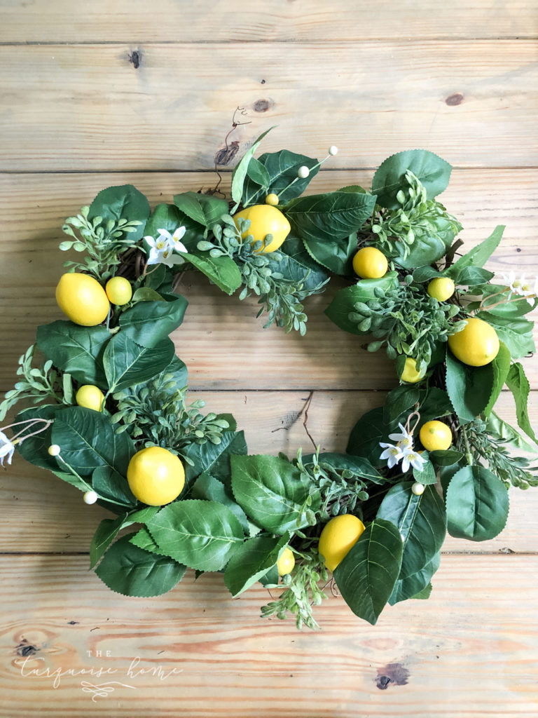 DIY Summer Lemon Wreath: next add in the lemons and other faux-tanicals