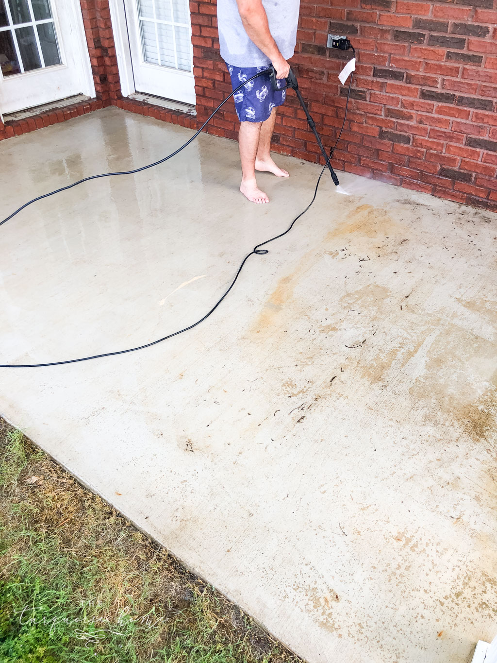 How to Paint a Concrete Patio - pressure wash the patio