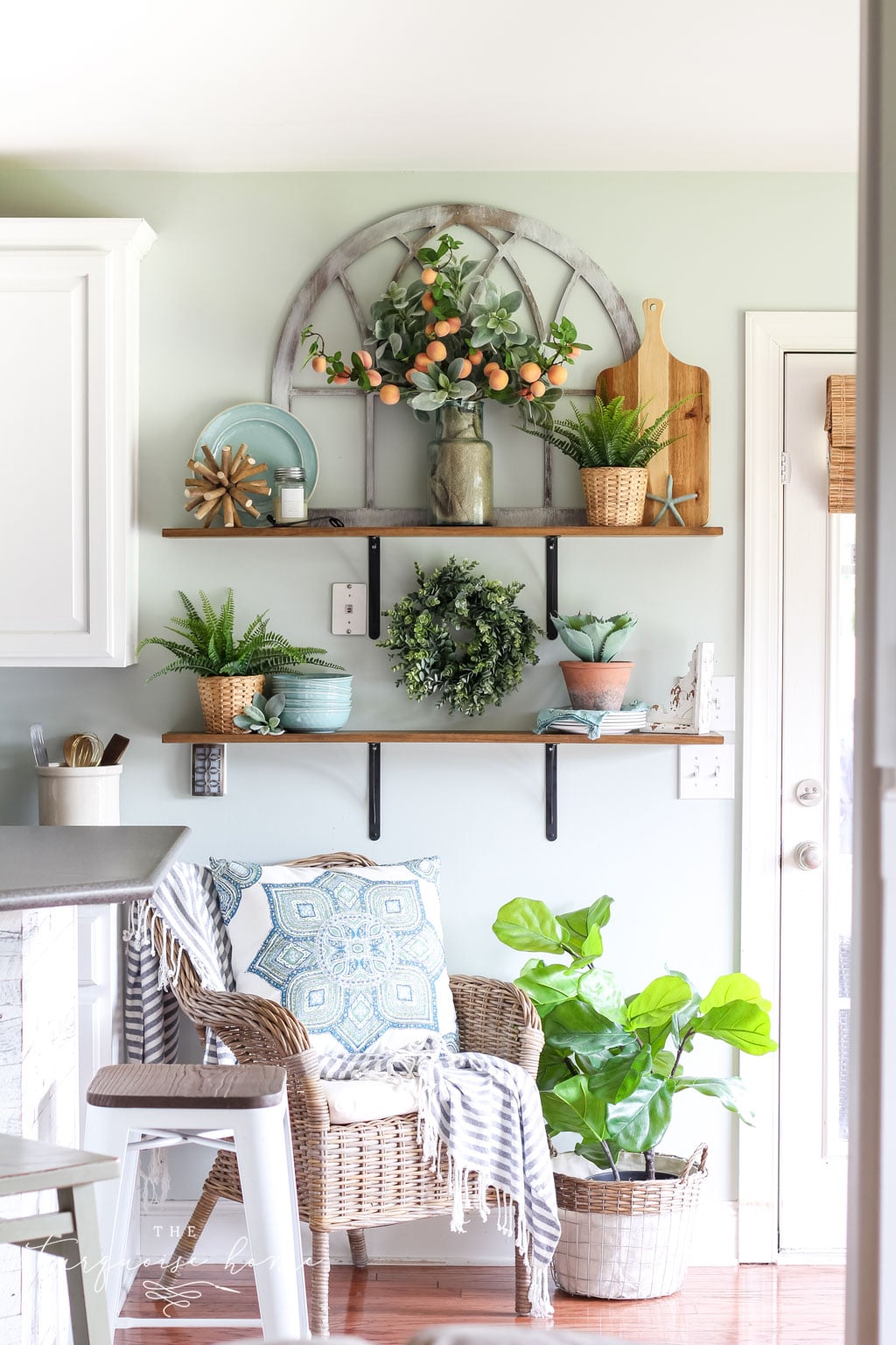 A Simple Peachy Summer Kitchen with gorgeous open shelves, turquoise plates, peach stems and fiddle leaf fig