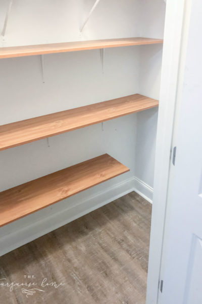 Utilize vertical space in a closet to make a DIY Pantry space!