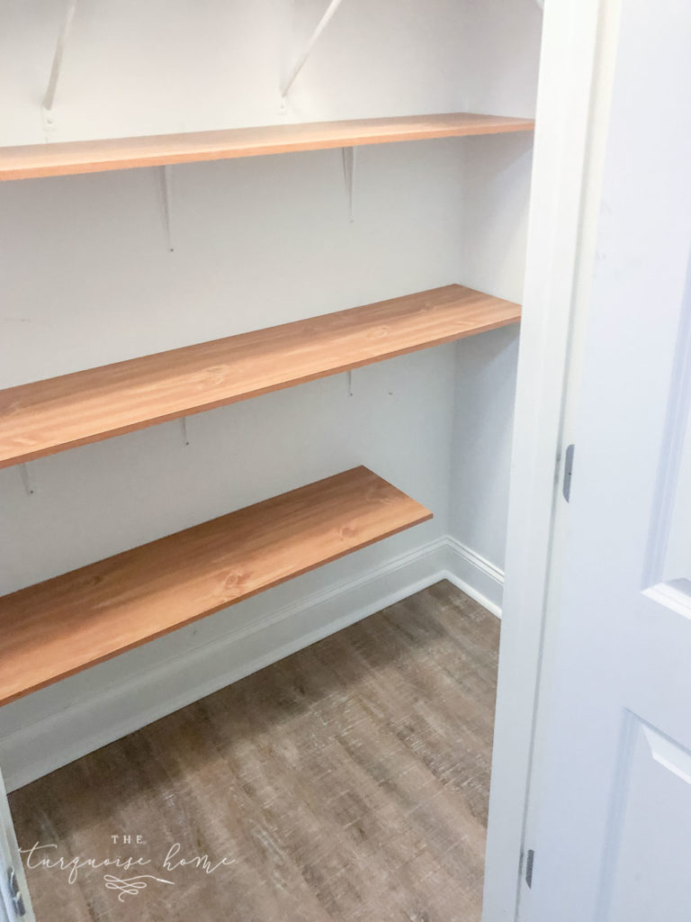 Utilize vertical space in a closet to make a DIY Pantry space! 