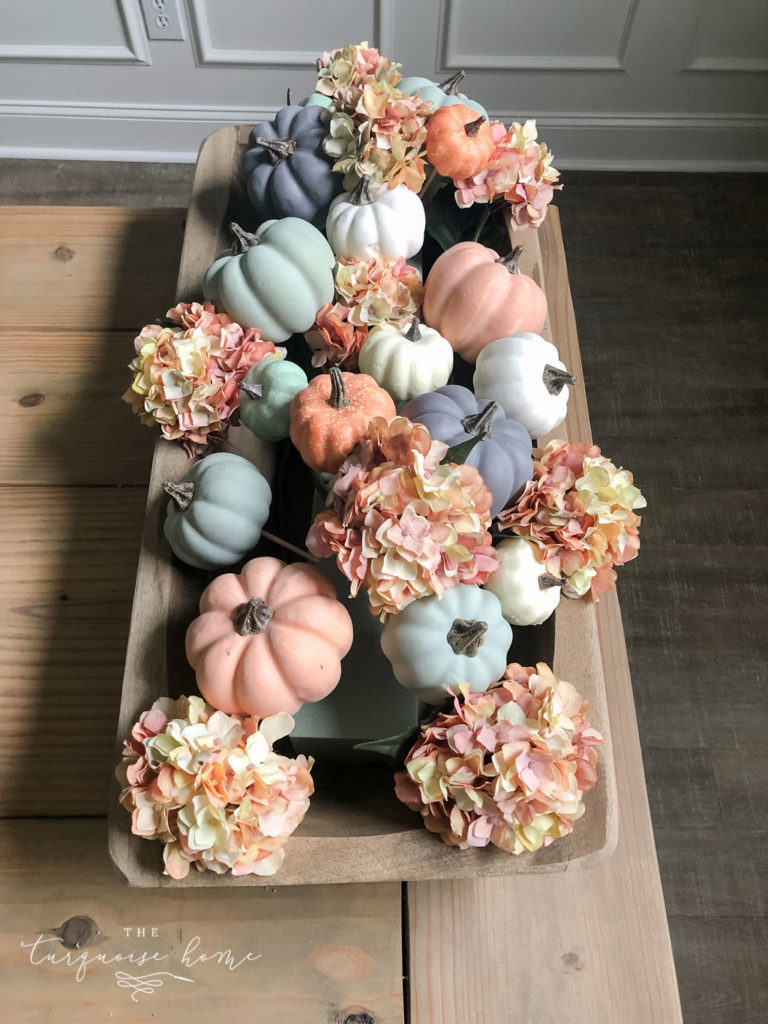 DIY Pumpkin & Dough Bowl Floral Fall Centerpiece - full tutorial | Start filling it in with the floral stems #falldecor #falldiy #diyhomedecor