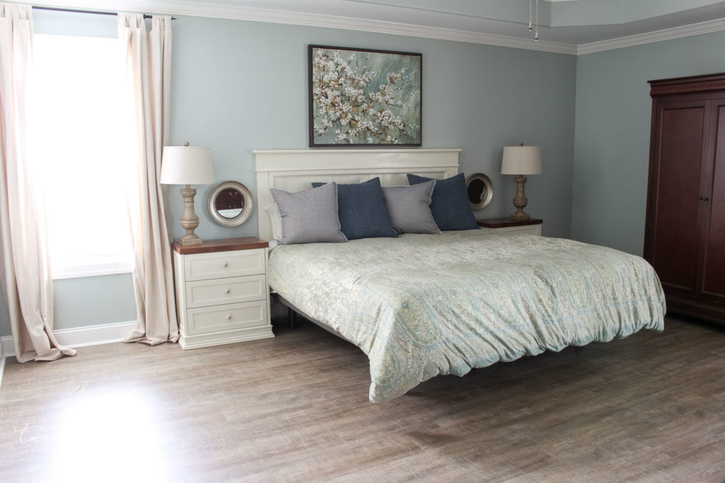 Master Bedroom without a rug under the bed, LVP floors, CoreTEC Boardwalk Oak, Farmhouse-style master bedroom