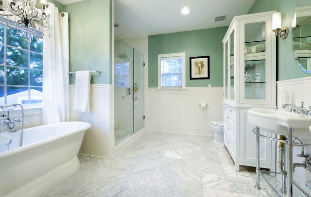 Wythe Blue painted walls with marble floors. Gorgeous bathroom design!