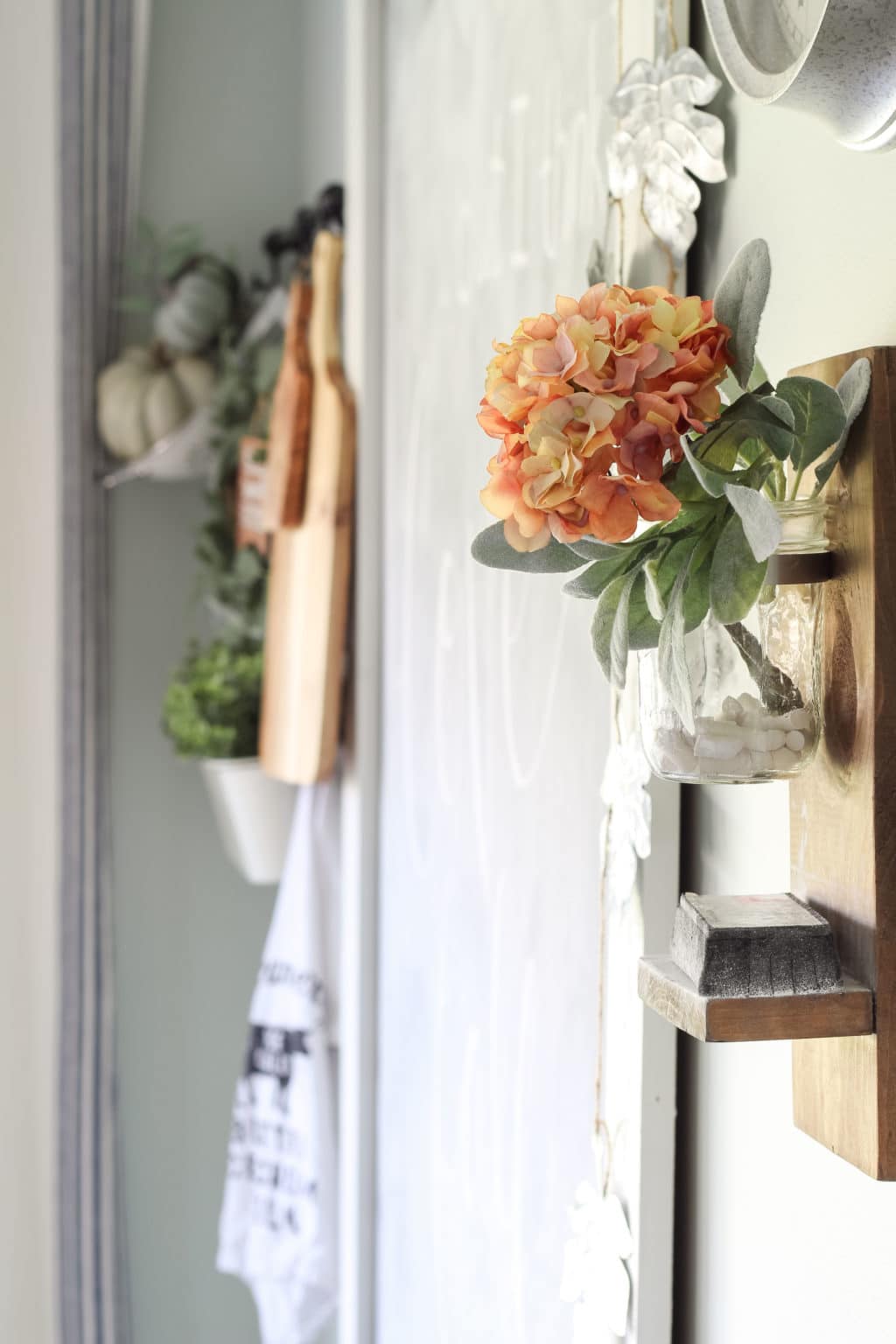 Chalk holder next to a chalkboard with a coral hydrangea for fall! Fall Home Tour | Fall Home Decor Ideas