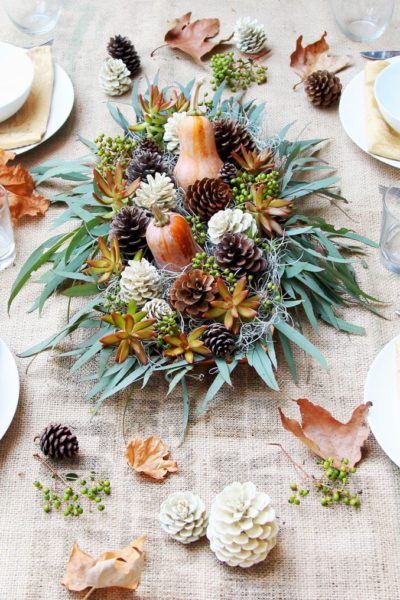 Thanksgiving table decor ideas - pinecones and gourds use nature to decorate the Thanksgiving dinner table
