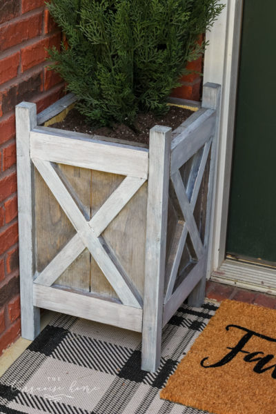 Gray washed wood technique on DIY wooden planters for the front door!