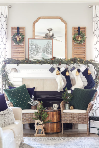 Green and Navy Simple Christmas Mantel - wicker chairs flanking a mantel