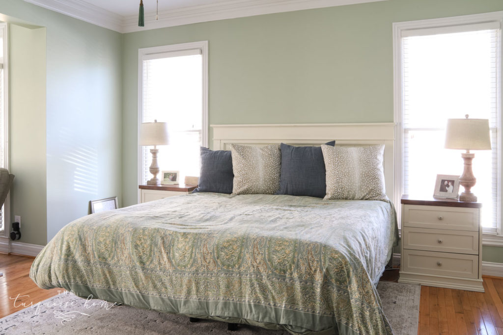 Master bedroom with pistachio green walls. 