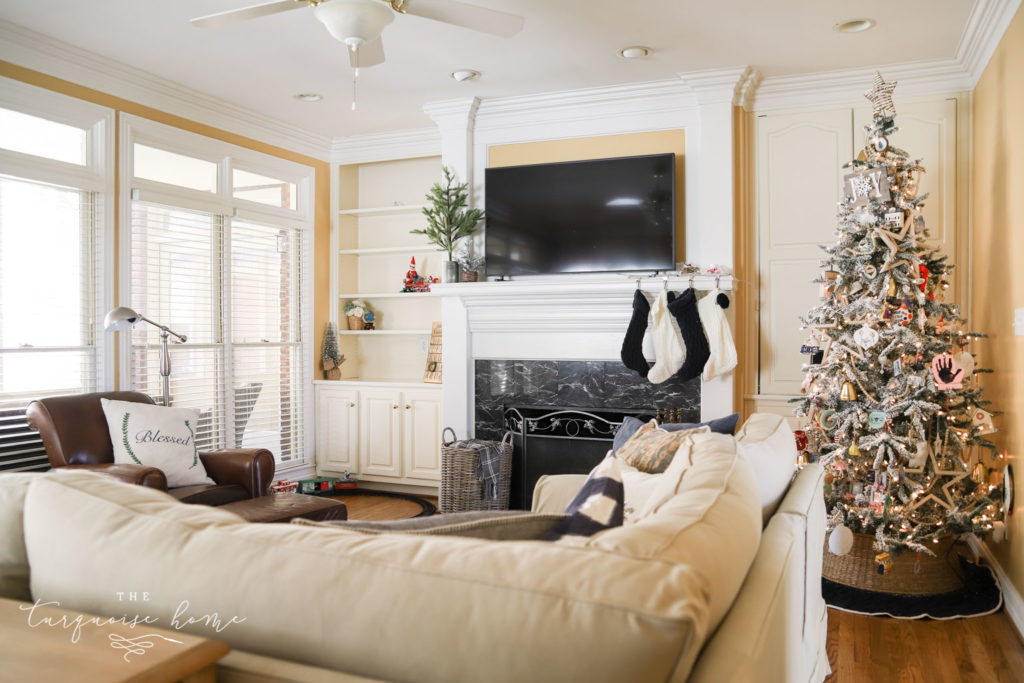 PB Comfort sectional in living room with wall of windows