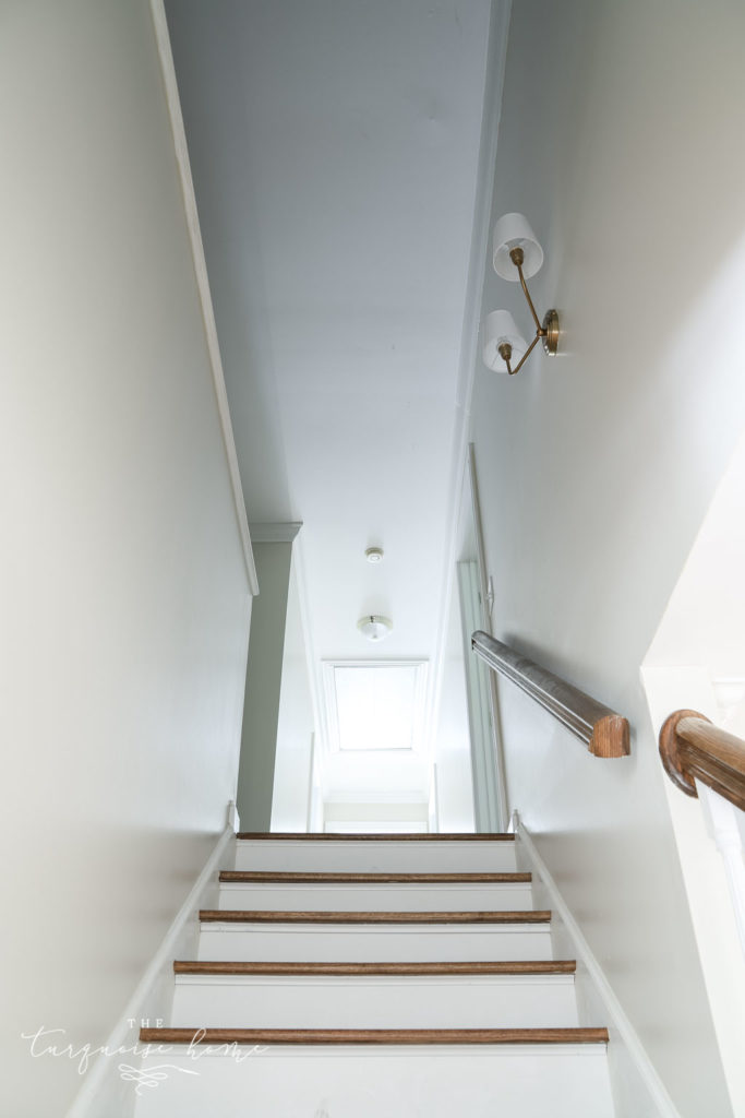 New Stairwell Lighting: Brass Double Sconce - Modern Sconce Lighting for Every Budget - leading up the stairs