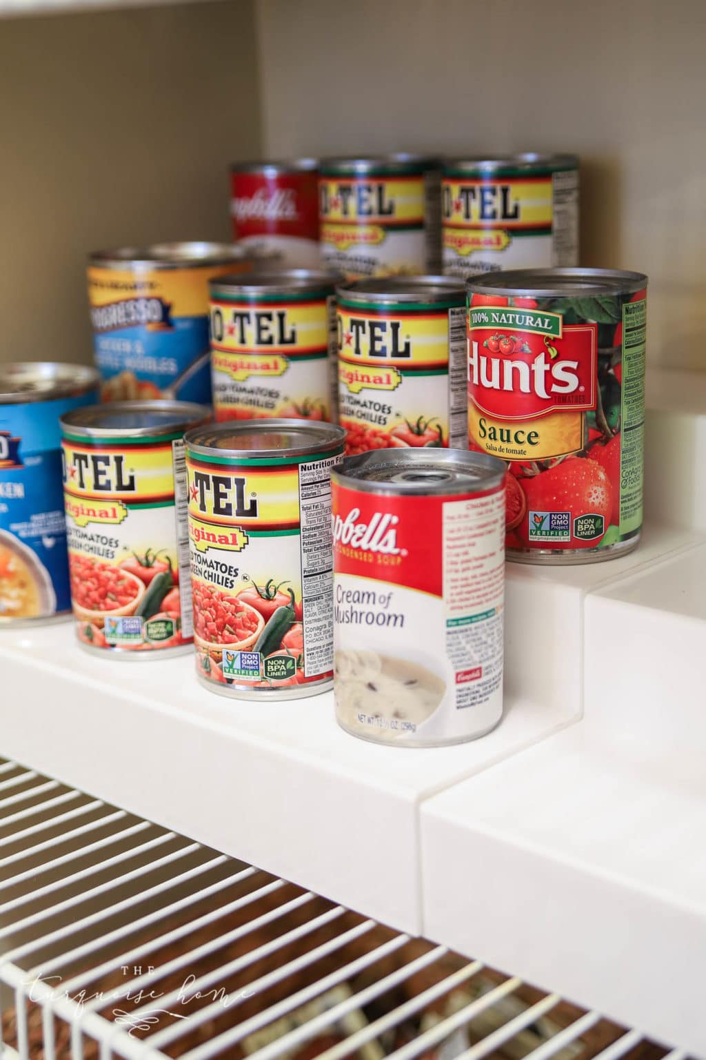 How to Organize a Pantry - can risers for can storage