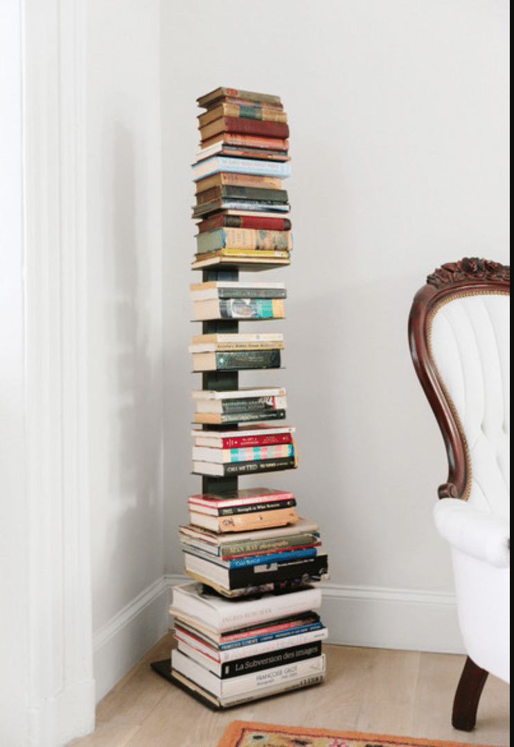 tall stacked books shelf filled with books