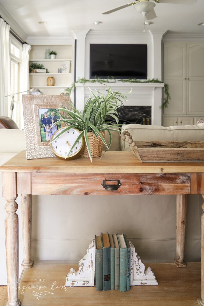 Styled Sofa Table Behind a Couch