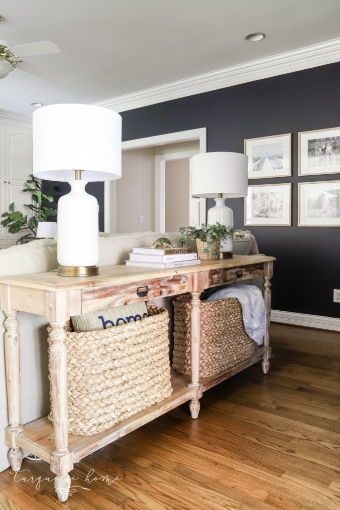 console table behind a sofa