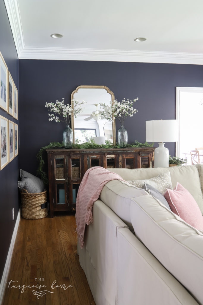 https://theturquoisehome.com/wp-content/uploads/2020/06/navy-living-room-reveal-5-683x1024.jpg