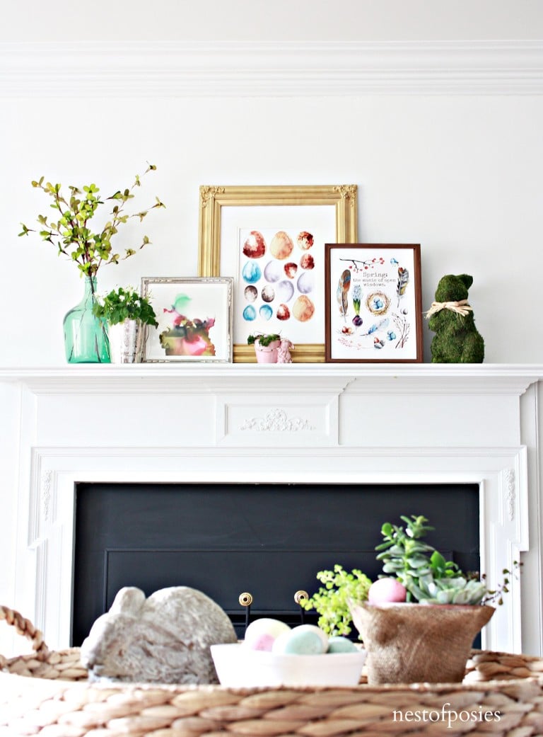 spring mantel decorations with colorful framed images and florals