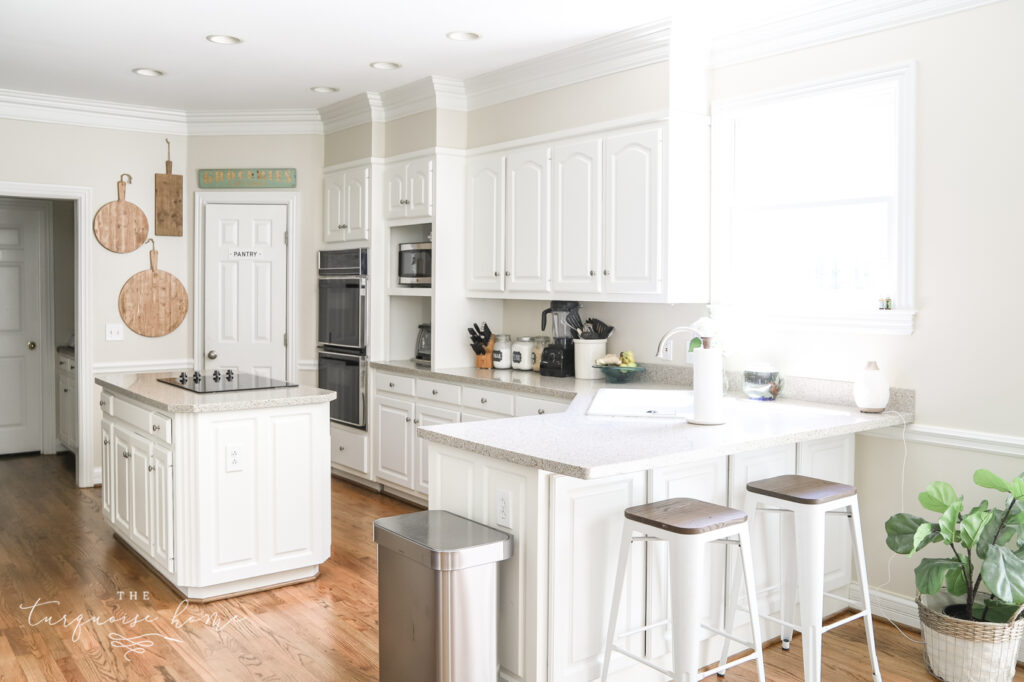 Traditional White Kitchen with Rich Hardwood Floors