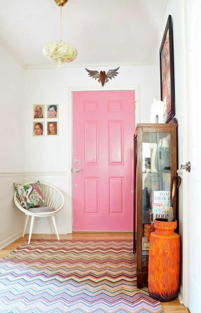 boho pink interior door in an entryway