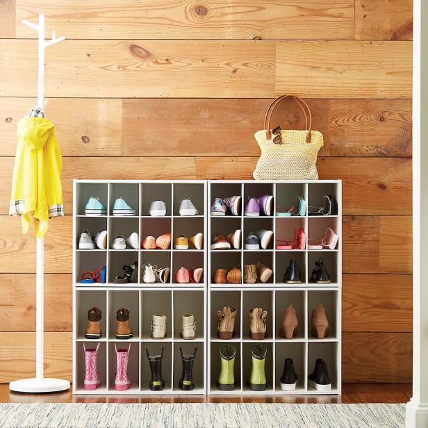 Stackable shoe organizer holds a dozen pairs of shoes.