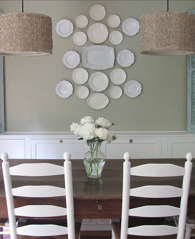 Gray Mirage by Benjamin Moore is actually a sage green paint color, as shown in this country-chic dining room.